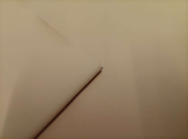50D Solona 0.5 Float Grid Medium Transparency Film with Floating Sand Effect polyester fabric