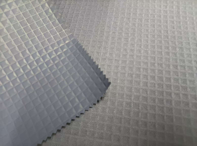 600D TPE with Pressed Three Dimensional Check Pattern polyester fabric