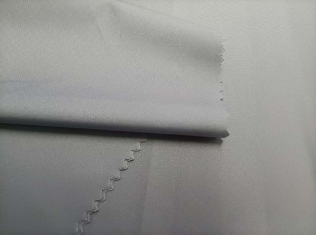 Hot stamped Film with Auspicious Cloud Patterns polyester fabric