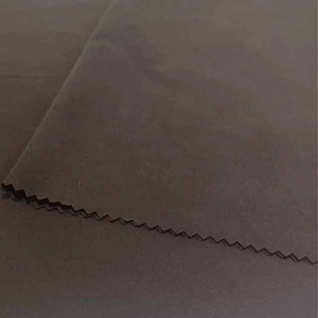 Matt smooth polyester fabric with brush effect