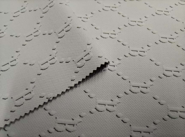 Knitted diamond shaped letter jacquard polyester fabric