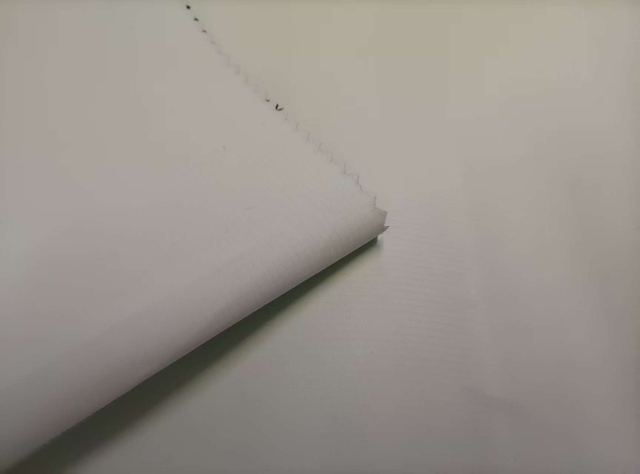 30D full dull double yarn 0.15mm grid Shengtai Green with middle transparent white TPU gray grid floating sand polyester fabric