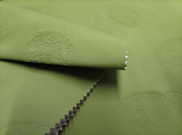 320D Nylon Taslan Composite 150G Jersey Fabric with High-Frequency Embossed Leaf Pattern