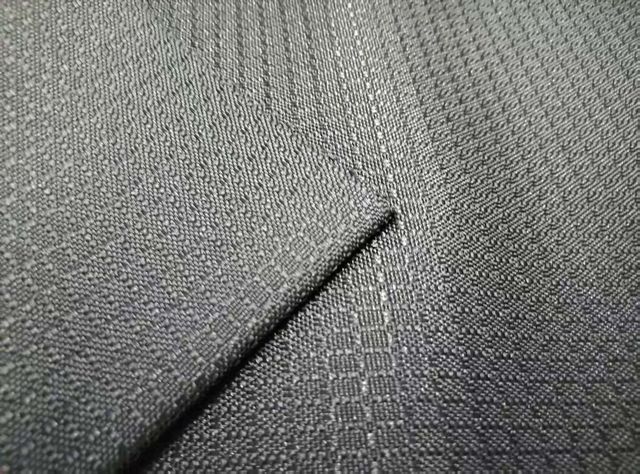 600D elastic filament with jacquard dot grid pattern polyester fabric