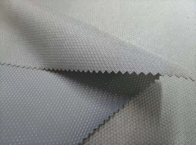 600D TPE with Pressed Small Triangle Pattern polyester fabric