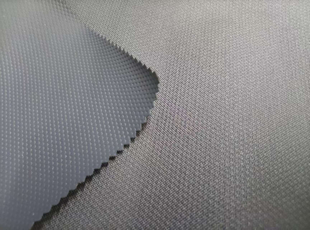 600D TPE with Pressed Small Triangle Pattern polyester fabric