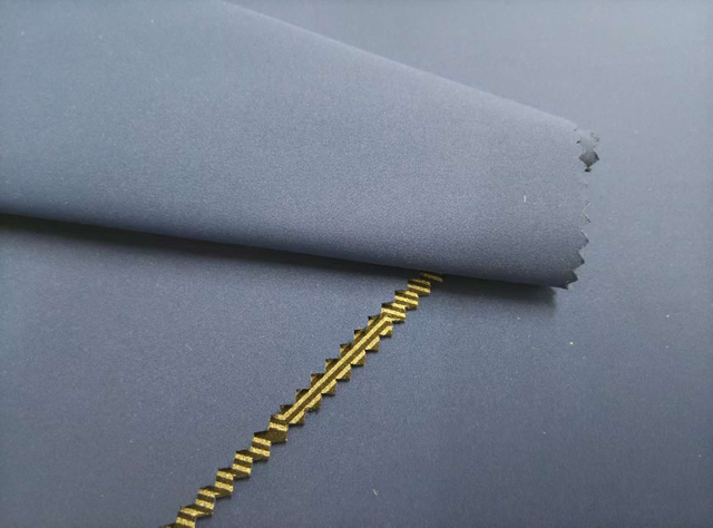 75D * 60D Mechanically Elastic 2/1 Twill Semi-Transparent TPU Pasted with Polyester-Ammonia Brushed and Ceramic-Printed polyester Fabric