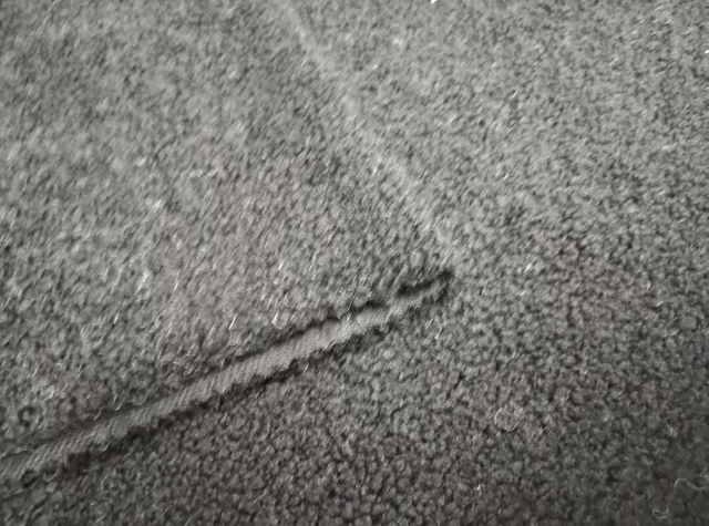 Teddy textured black polyester fabric