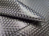 Semi transparent TPU is pasted on 600D fabric, with a 3D embossed pattern and a glossy finish