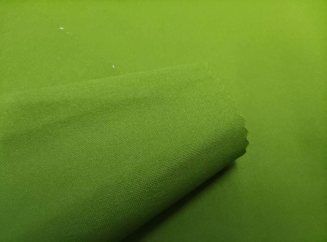75*150 Warp Twisted Solana with Embossed Dots and White Film Lamination polyester fabric