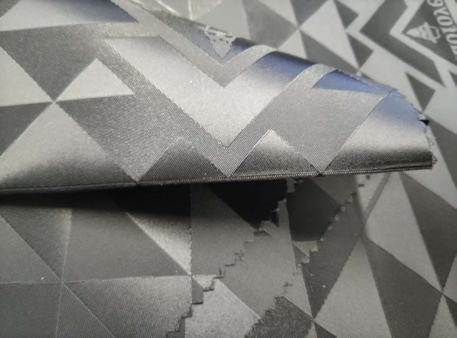 Nylon Yangyang triangle letter jacquard