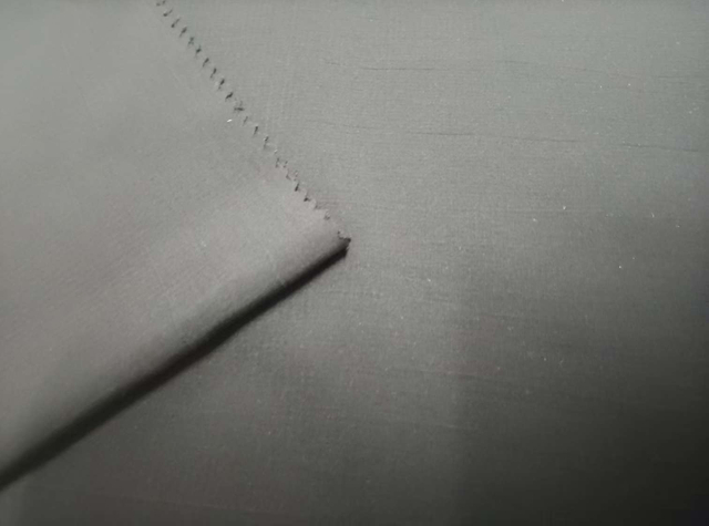 Sorona Three Thread Check polyester fabric