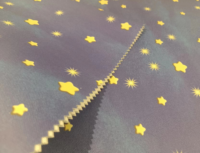 Printed recycled PET polyester fabric with luminous effect (shine in the night)