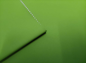 50D Solana 0.15 double-line grid high-transparency film with floating sand effect polyester fabric