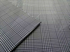Yarn-dyed black and white large-small check polyester fabric