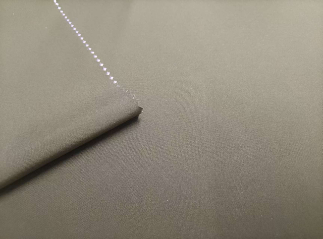 150D Mechanically Elastic TPU White Film Pasted with 20D Diamond Shaped "Kete" polyester fabric