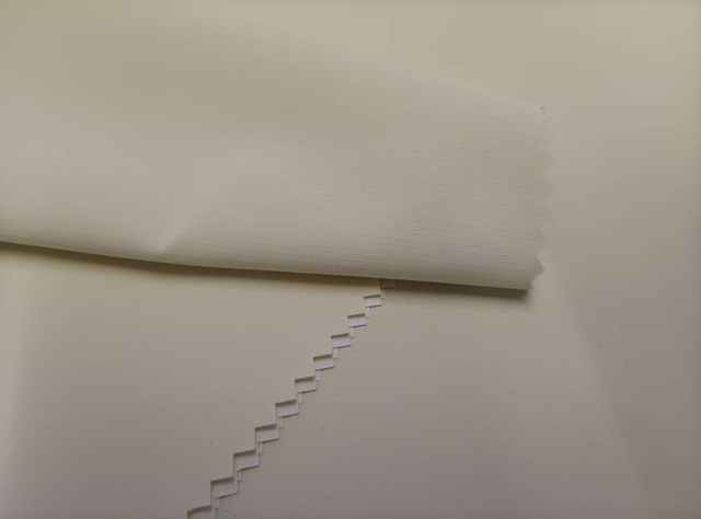 Release paper with single grid pattern polyester fabric