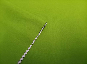 75*150 Warp Twisted Solana with Embossed Dots and White Film Lamination polyester fabric