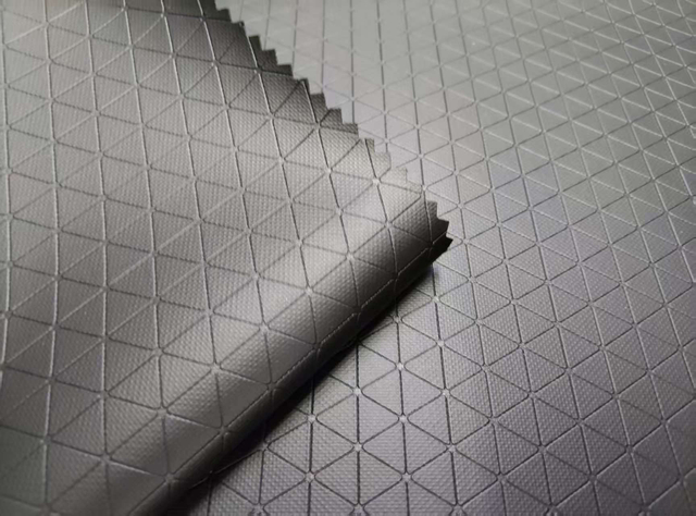 RPET600D double-side recycled TPU,debossed with triangular patterns, matte surface polyester fabric