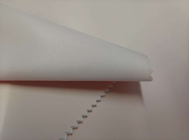 Degradable 75D Twisted Filament 2/2 Twill Laminated with 180G Jersey Fabric