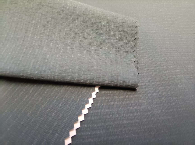 75D*150D twisted Solana vertical stripe grid high-transparency TPU film polyester fabric