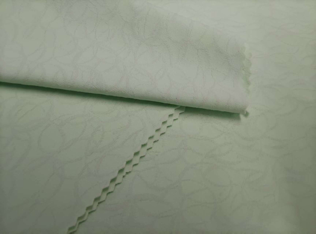 Knitted Irregular Jacquard in Two Colors nylon fabric