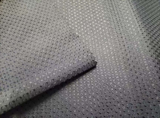 150D elastic filament with left and right jacquard pattern of dot design polyester fabric