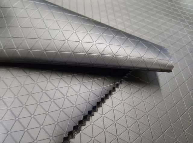 RPET600D double-side recycled TPU,debossed with triangular patterns, matte surface polyester fabric