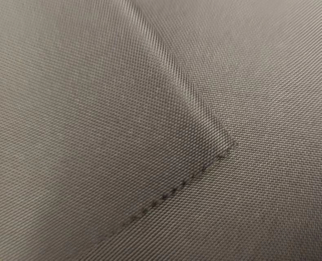 RPET300D semi-matt polyester fabric.