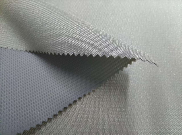 600D TPE with Pressed Hollow Diamond Pattern polyester fabric