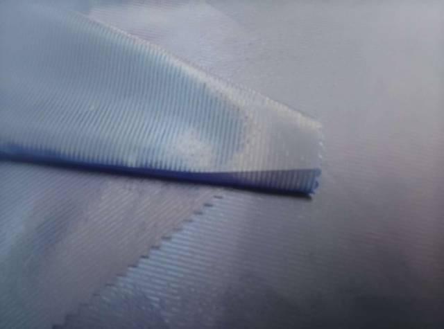 Hidden stripe check polyester fabric