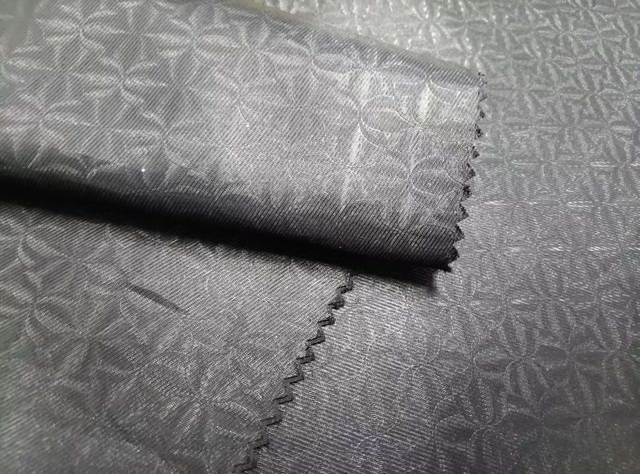Polyester recycled 3/1 twill embossed fabric
