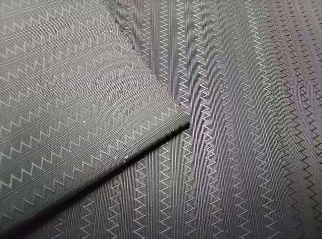 400D filament with horizontal wide spaced toothed pattern polyester fabric