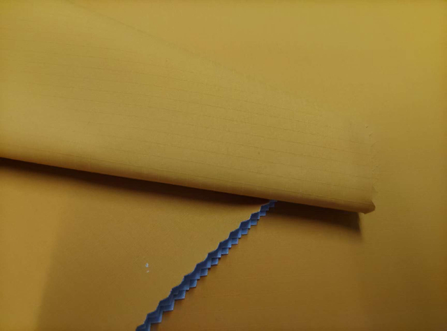 50D Solona 0.5 Float Grid Medium Transparency Film with Floating Sand Effect polyester fabric