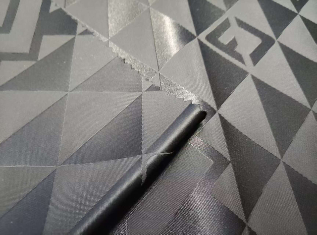 Nylon Yangyang triangle letter jacquard composite with 180G jacquard fabric