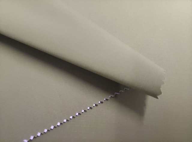 Bio-based Sorona grid semitransparent TPU white film pasted with 20D diamond-shaped KT polyester fabric