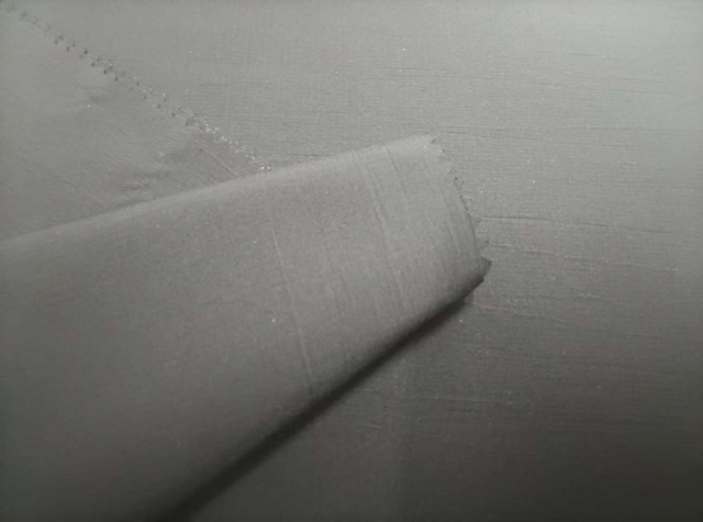Sorona Three Thread Check polyester fabric