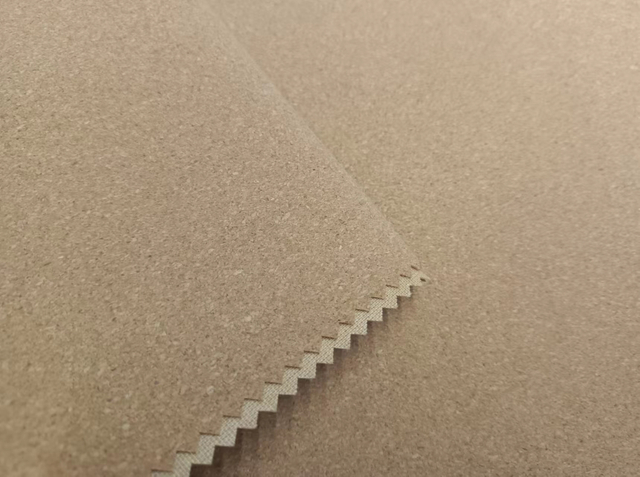 Woodware bonded with polyester fabric