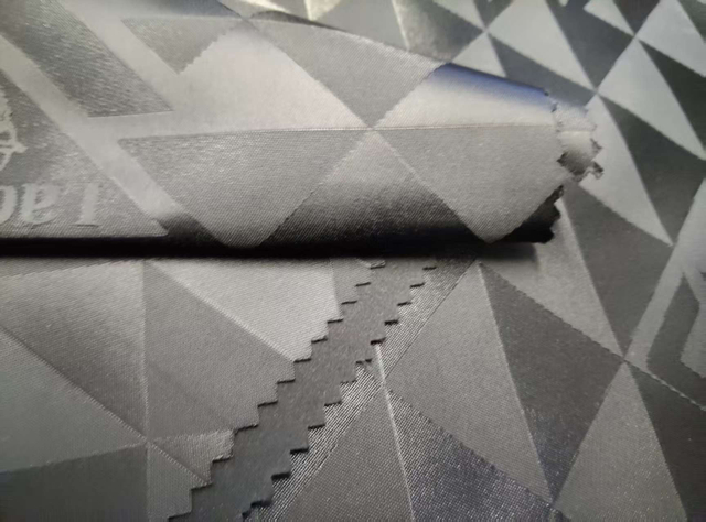 Nylon Yangyang triangle letter jacquard composite with 180G jacquard fabric