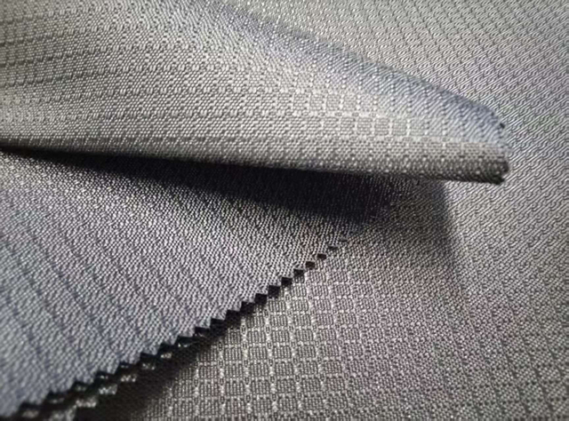 600D elastic filament with jacquard dot grid pattern polyester fabric