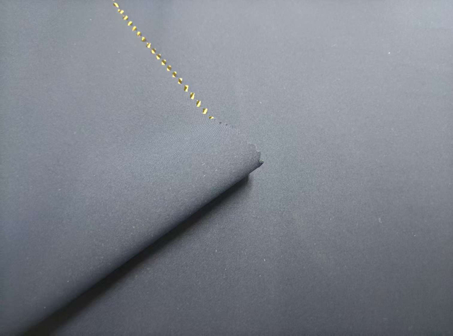 75D * 60D Mechanically Elastic 2/1 Twill Semi-Transparent TPU Pasted with Polyester-Ammonia Brushed and Ceramic-Printed polyester Fabric