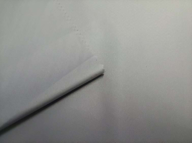 Hot stamped Film with Auspicious Cloud Patterns polyester fabric