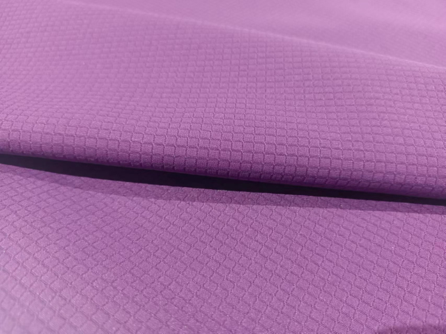Stretching ripstop weaved polyester fabric