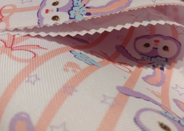 Printed RPET 600D oxford polyester fabric..
